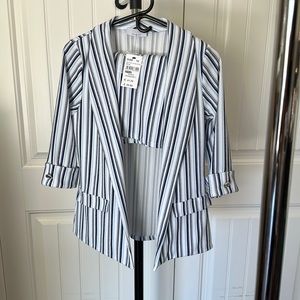 Brand is Quiz.  Purchased in Ireland.  Brand new with tags.  Blazer & shorts.